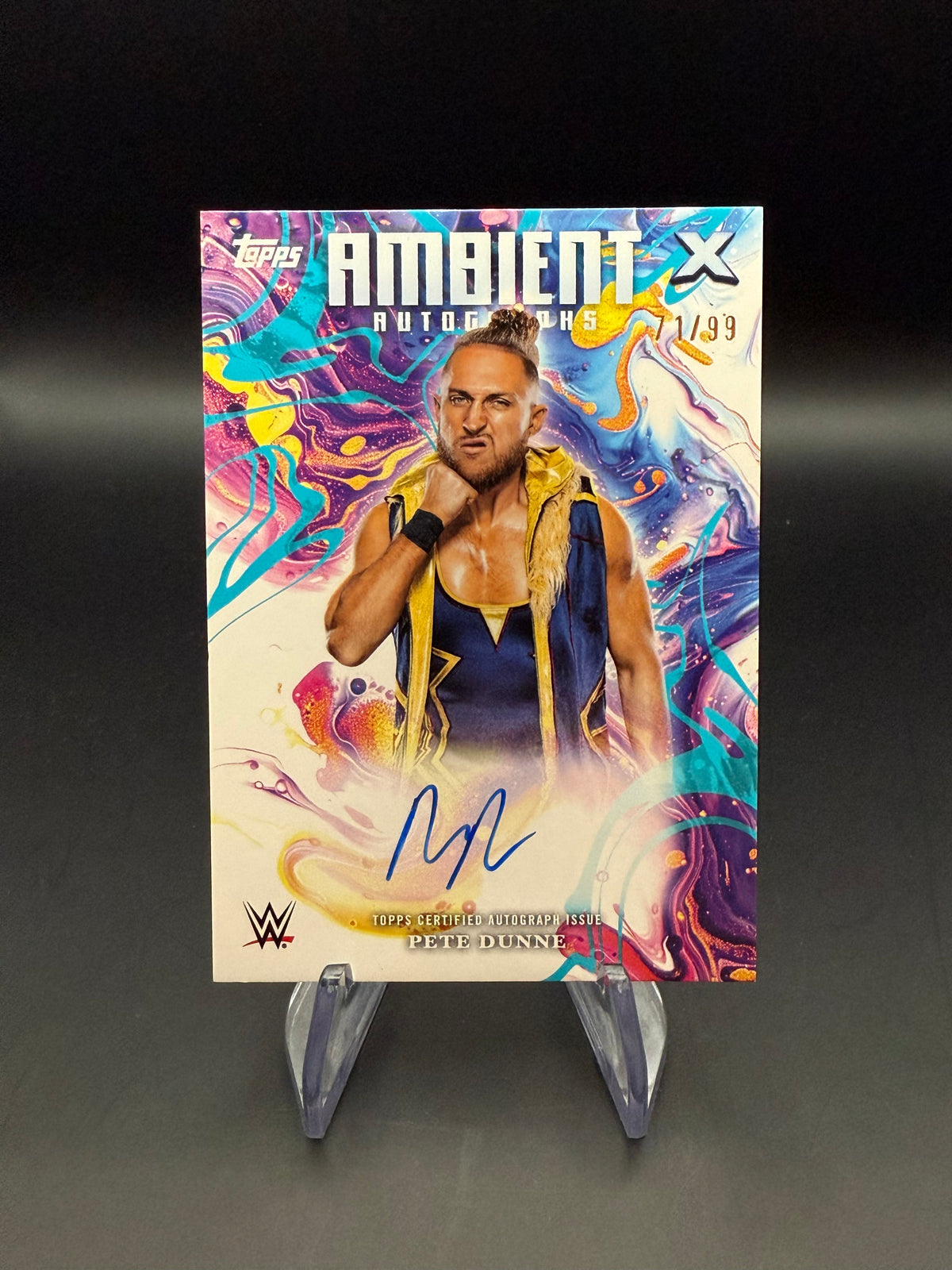 Pete Dunne 2025 WWE Topps Exalted Aqua Ambient Autograph /99