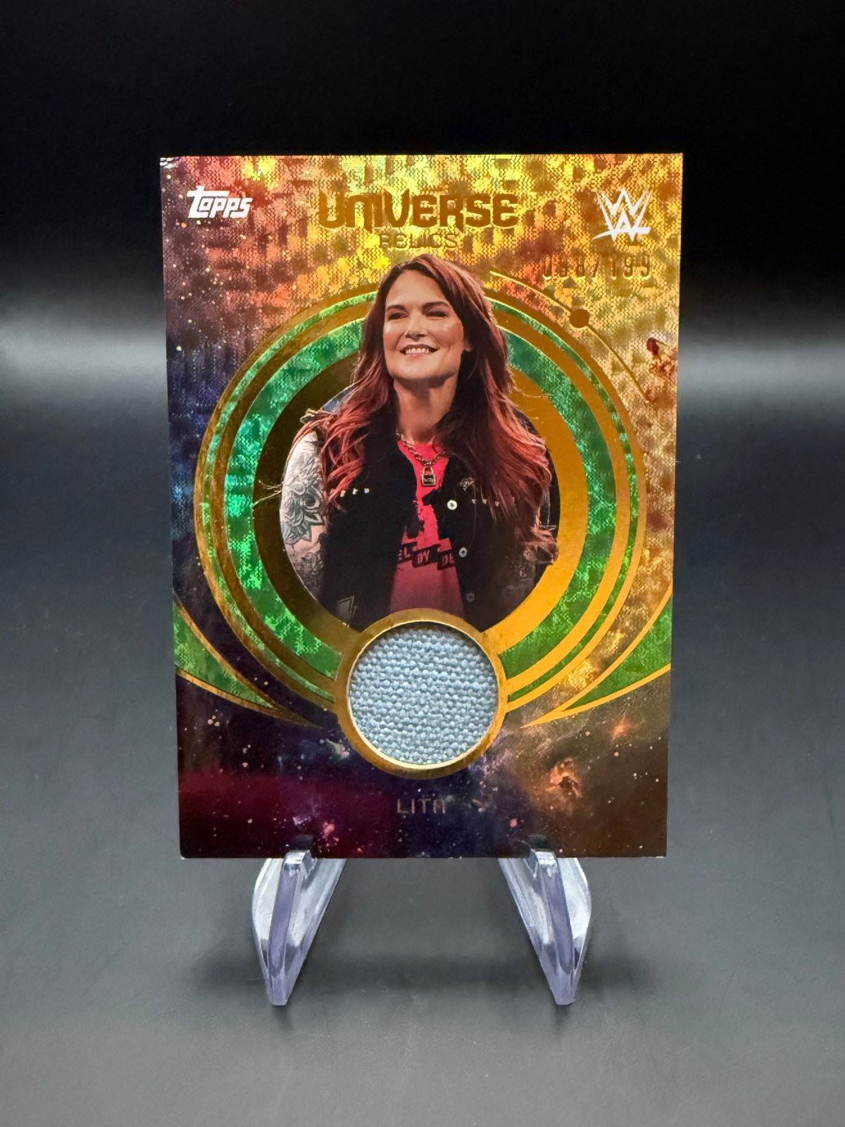 Lita 2025 WWE Topps Universe Electric Green Relic /199