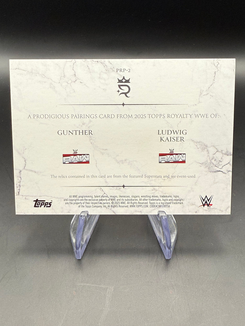 Gunther & Ludwig Kaiser 2025 WWE Topps Royalty Prodigious Pairings Dual Patch Purple /50