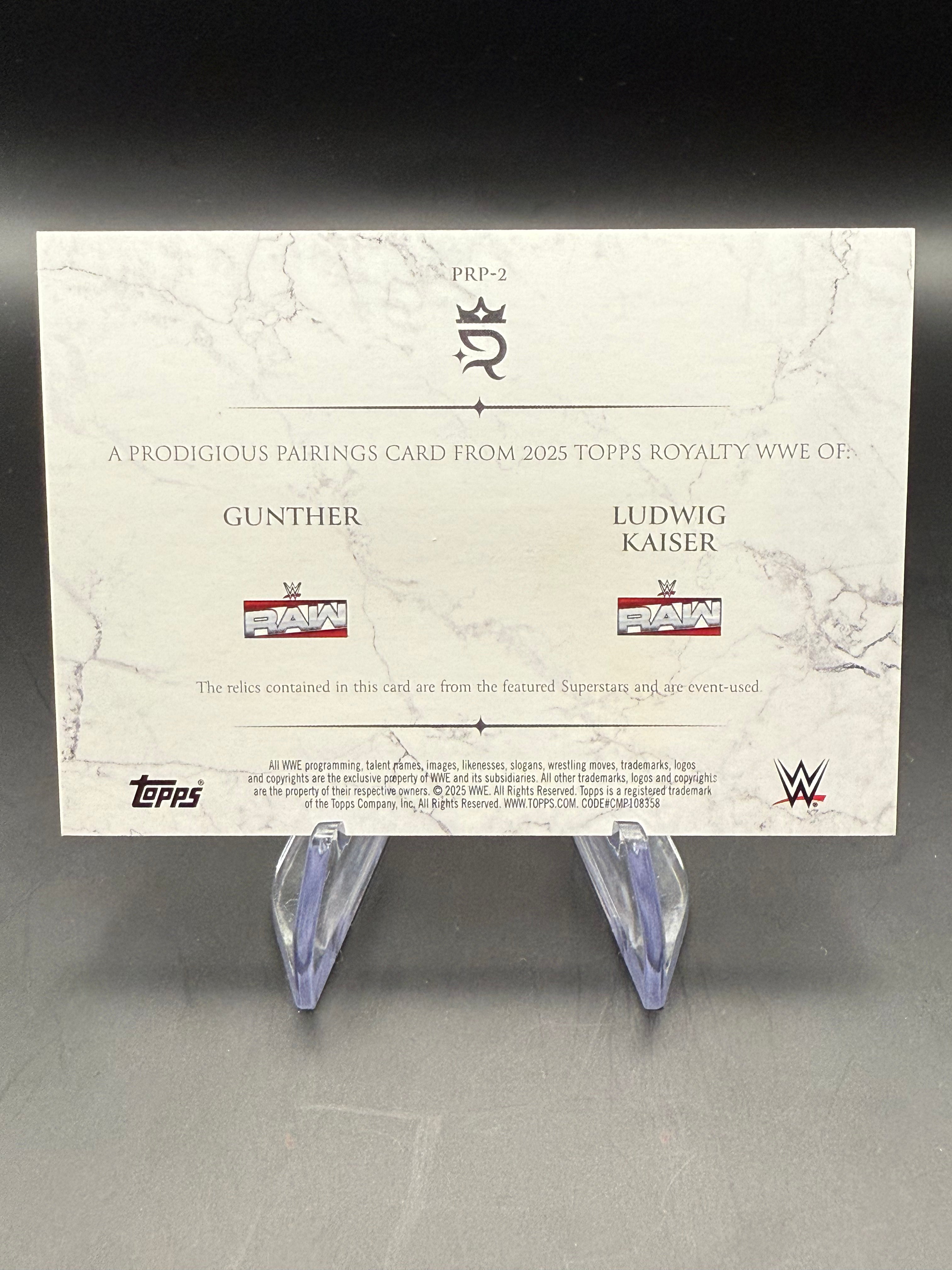 Gunther & Ludwig Kaiser 2025 WWE Topps Royalty Prodigious Pairings Dual Patch Purple /50