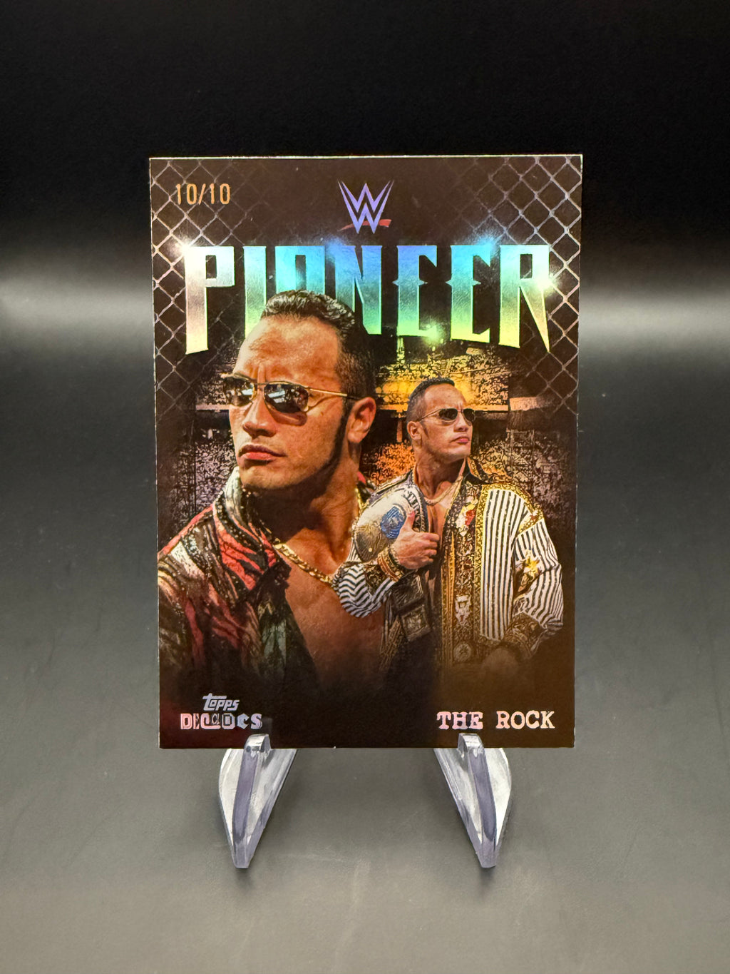 The Rock 2026 WWE Topps Decades Pioneer Black Bookend 10/10