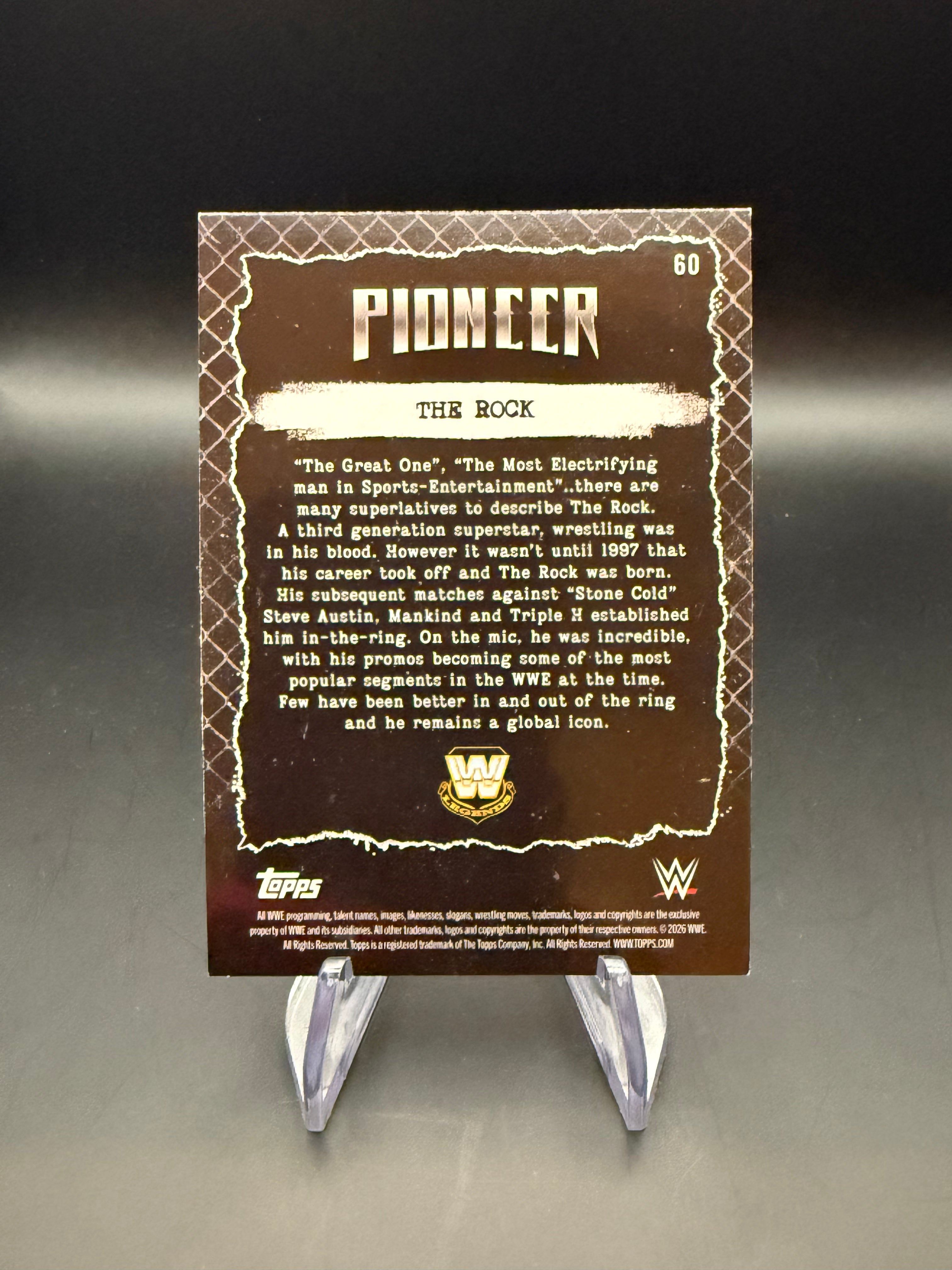 The Rock 2026 WWE Topps Decades Pioneer Black Bookend 10/10