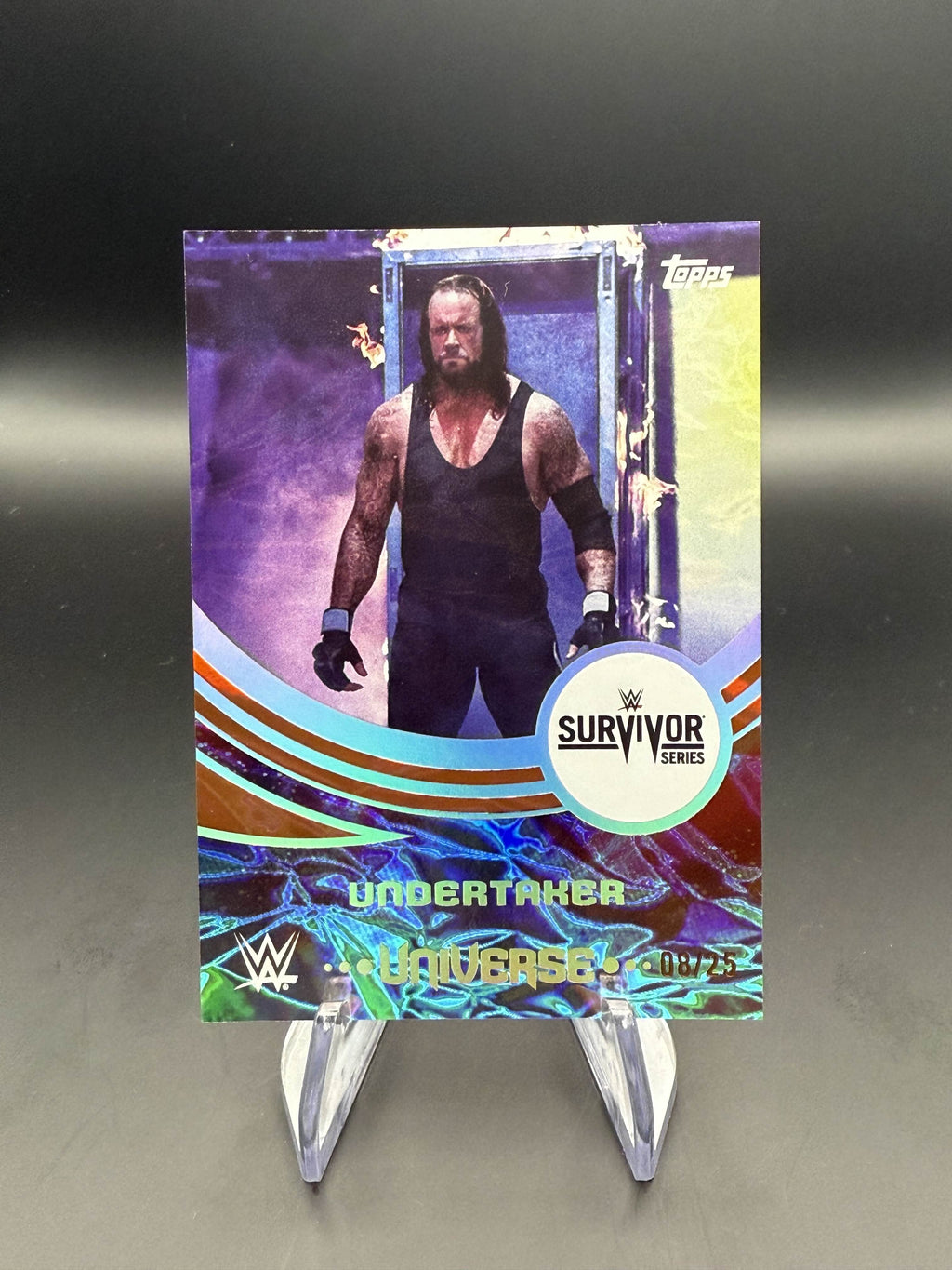 Undertaker 2025 WWE Topps Universe Orange Warp Event Variation /25