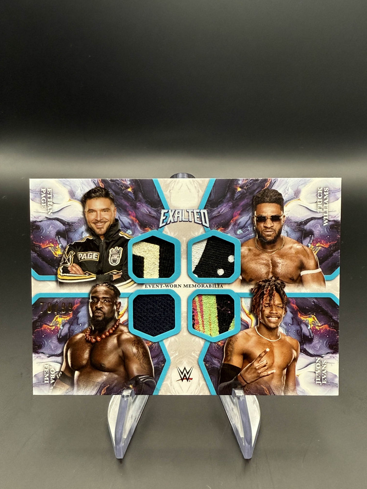Oba Femi / Trick Williams / Je'Von Evans / Ethan Page 2025 WWE Topps Exalted Quad Relic Aqua /99