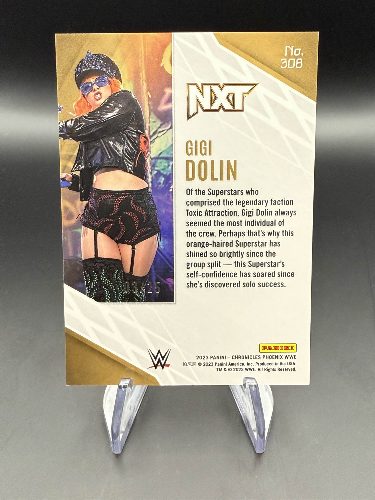 Gigi Dolin 2023 WWE Panini Chronicles Phoenix Pink Mojo /25
