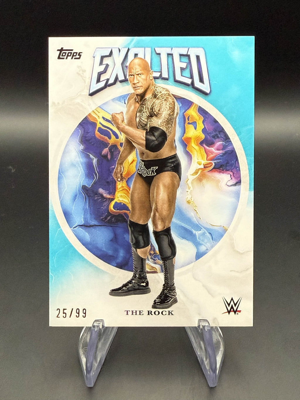 The Rock 2025 WWE Topps Exalted Aqua /99
